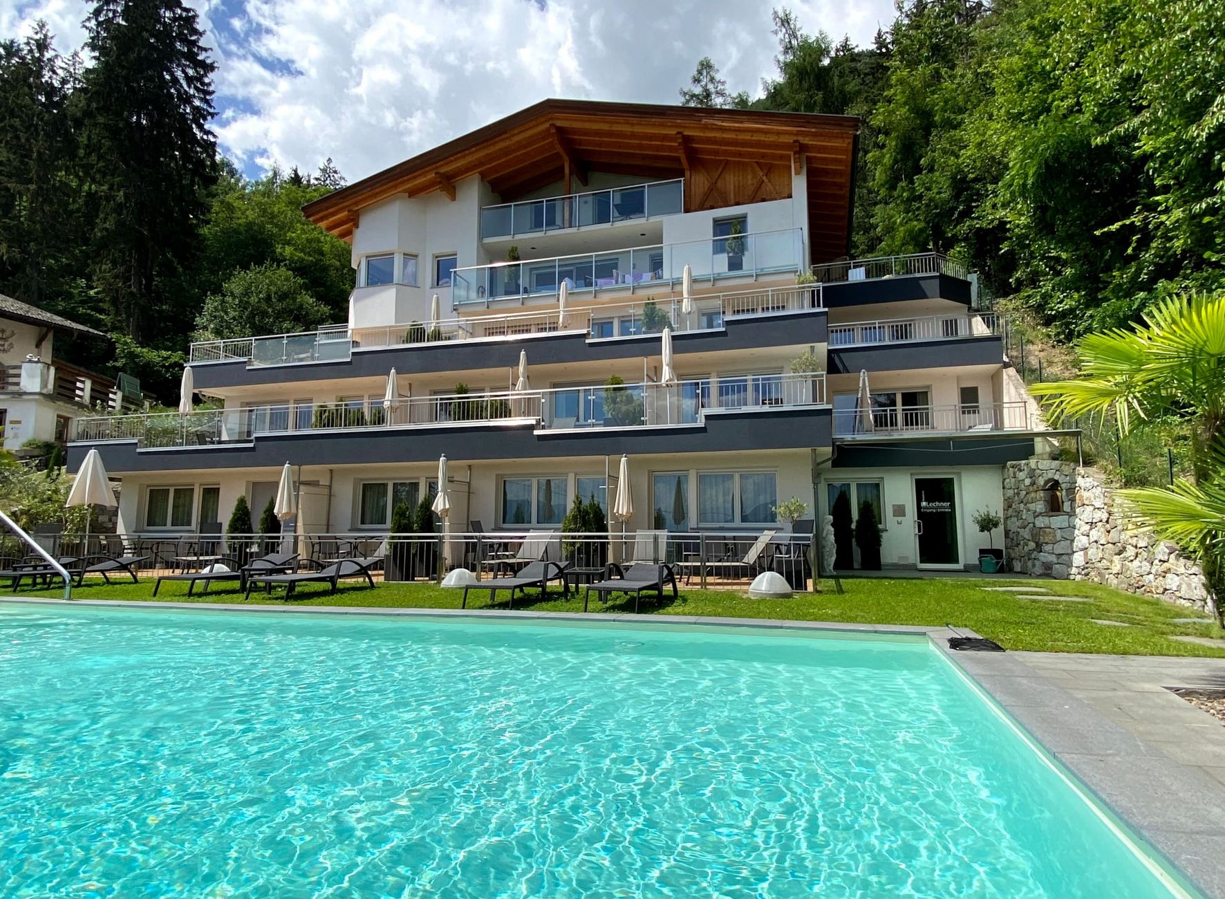 Residence Lechner with outdoor pool and sunbathing lawn in Dorf Tirol Residence Dorf Tirol outdoor pool sunbathing lawn Lechner